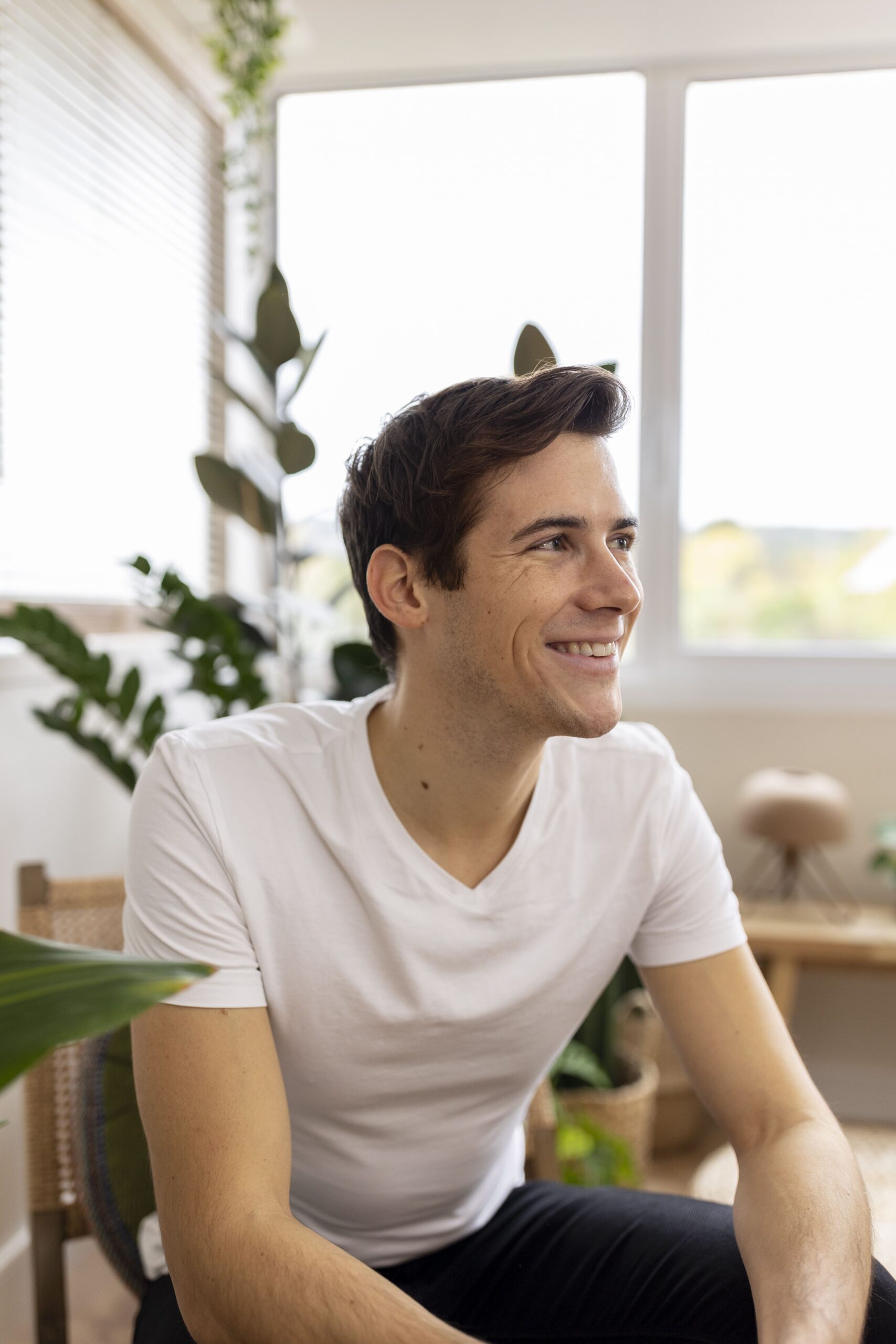 young-man-smiling-while-having-great-time (1)